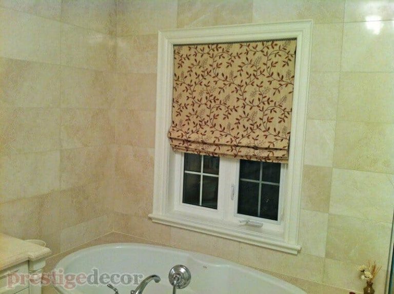 Silk Roman blinds in a luxurious bathroom.