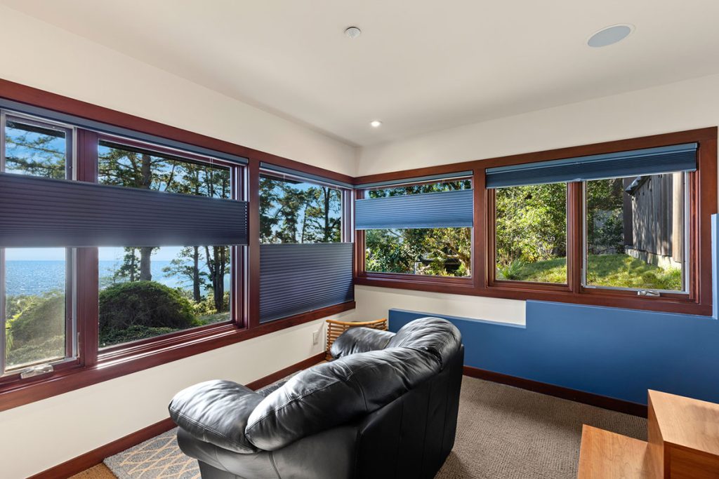 Blinds and Window treatments Window coverings in home with view of the ocean